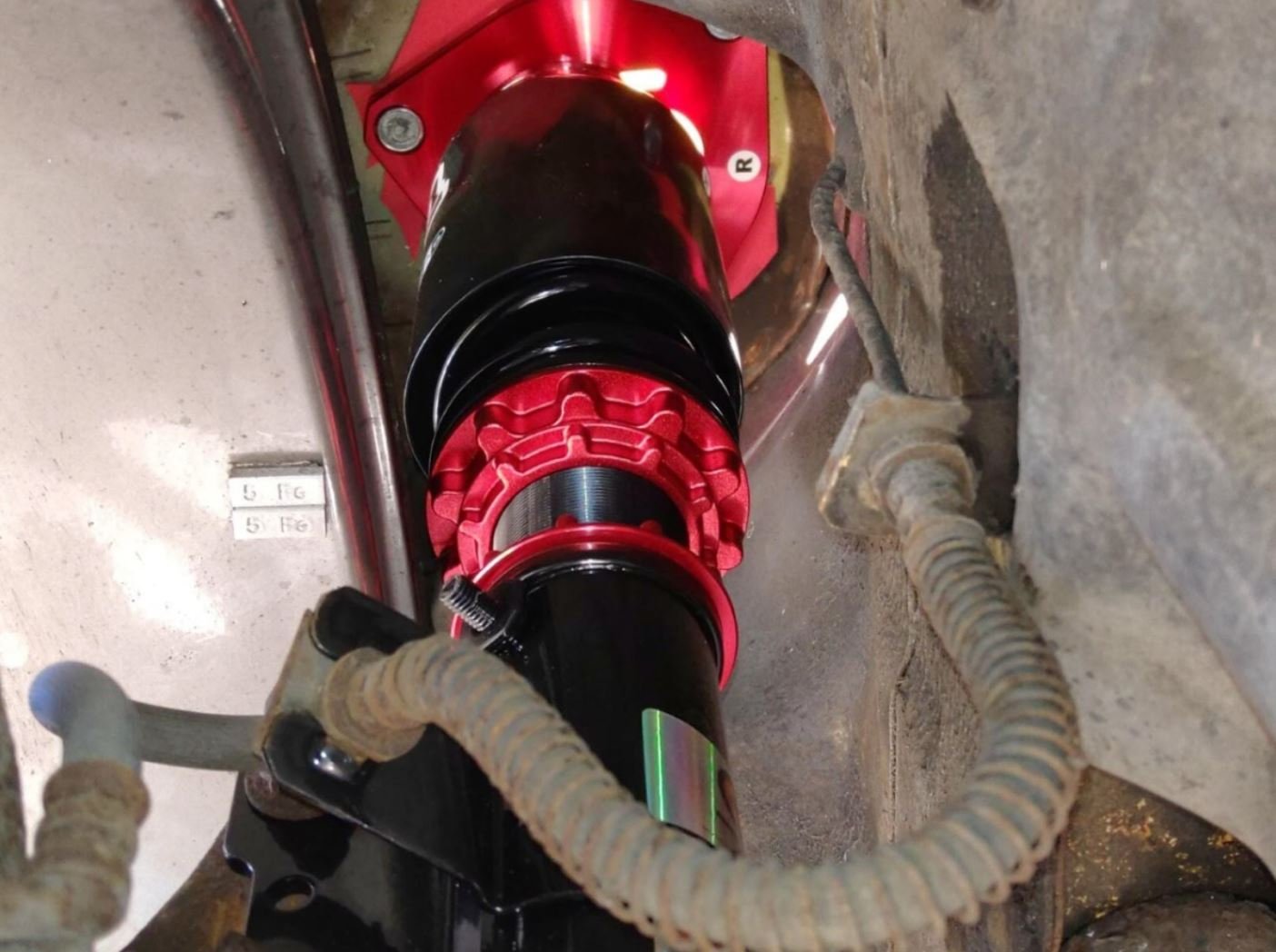 Suspension_2020-11-15_RH Front tire to suspension clearance on stock fasteners.JPG